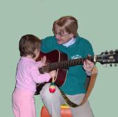 strumming the guitar